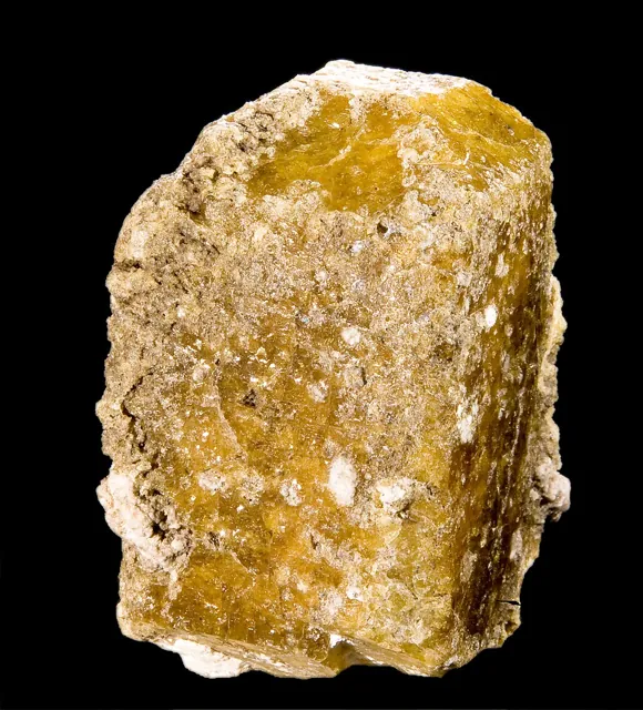 Vésuvianite (Ca₁₀(Mg,Fe)₂Al₄(SiO₄)₅(Si₂O₇)₂(OH,F)₄) : minéral de la famille « silicates (sorosilicates) », système quadratique, dureté 6 à 7 (Mohs), couleurs : brun, vert, jaune, violet
